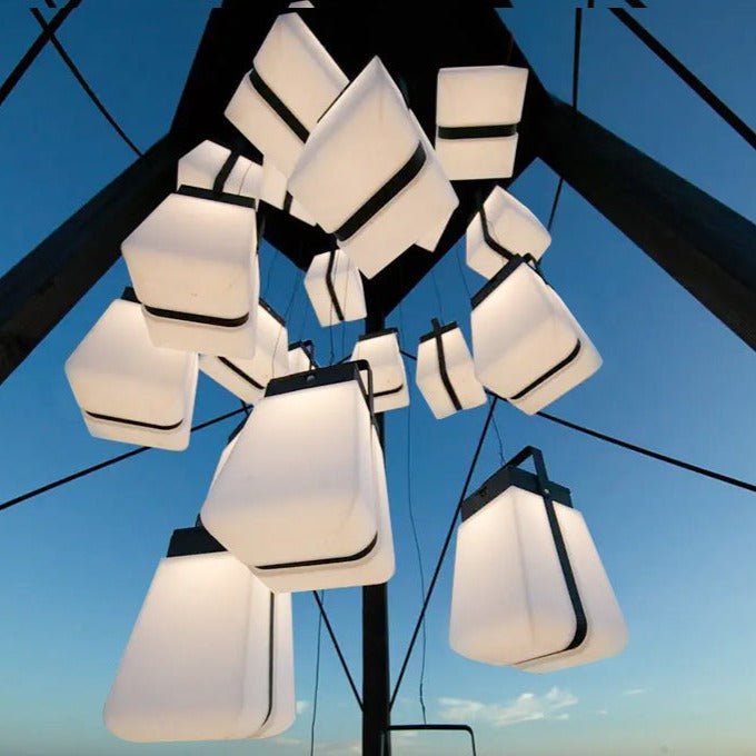 Cluster of Junam Lights hanging against blue sky